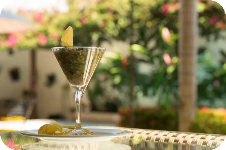 A plated dish served on a glass on the Casa Horizontes garden terrace.
