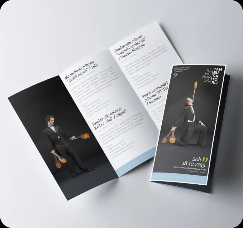 The 2013 festival tri-fold programme leaflet opened to its inside spread.